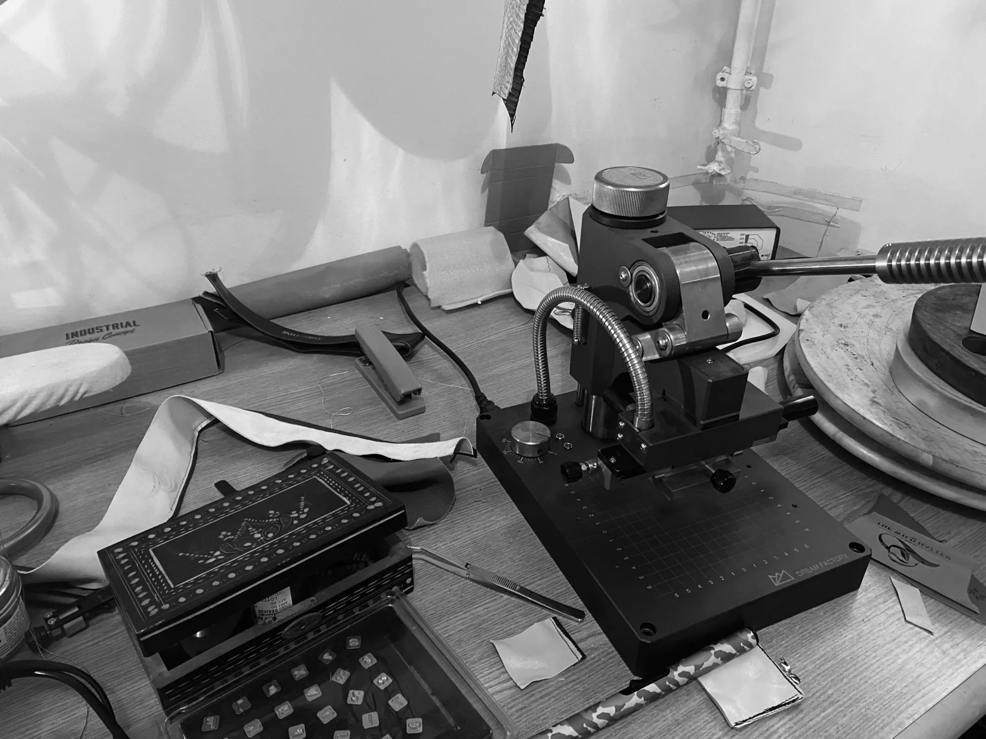 Vintage hat-making machinery on the workbench